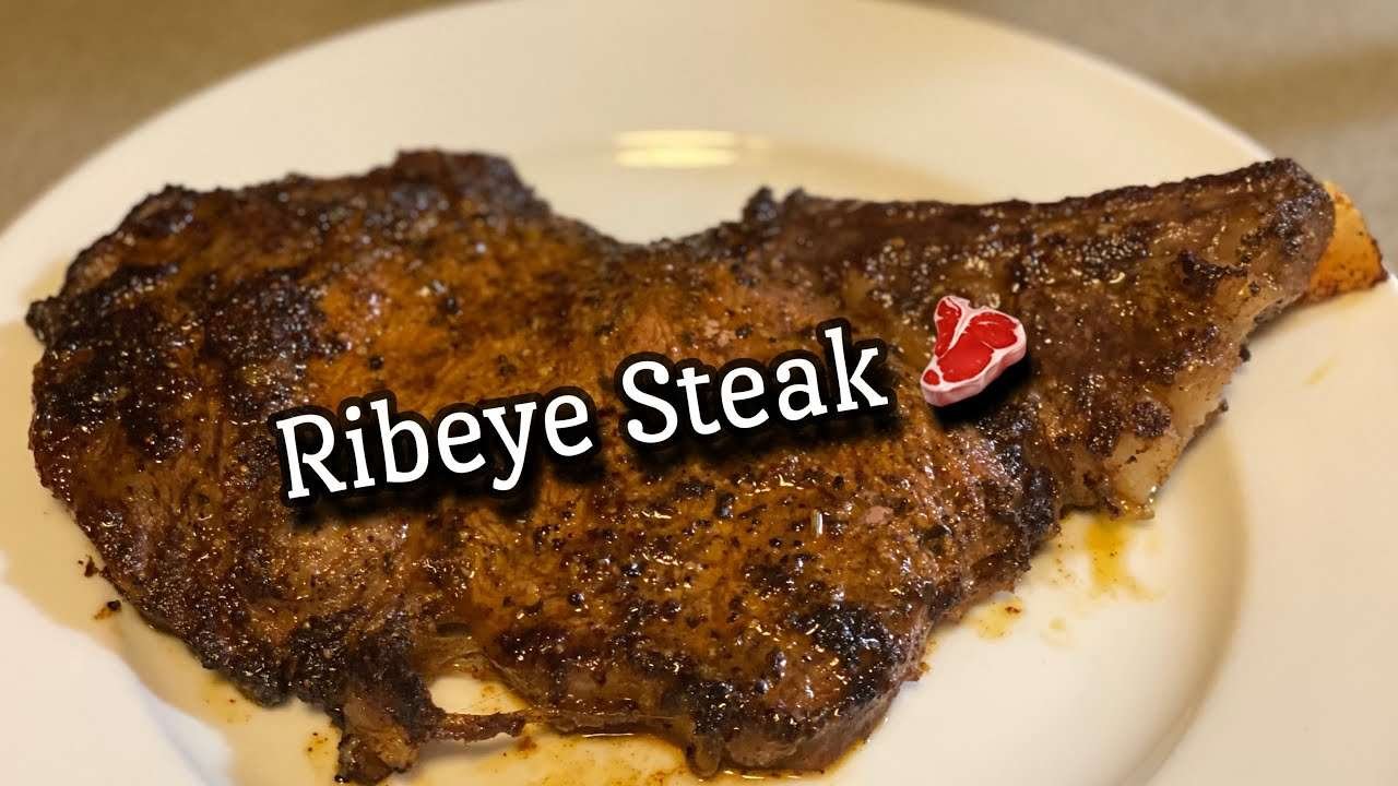 The Best Bone-In Ribeye Steak with Garlic Butter