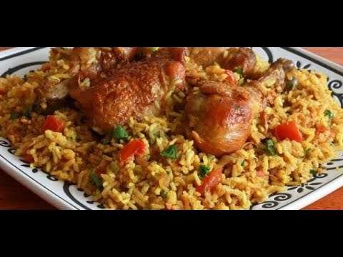 Rice kabsa with chicken, vegetables and hot sauce/كبسة الارز بالدجاج