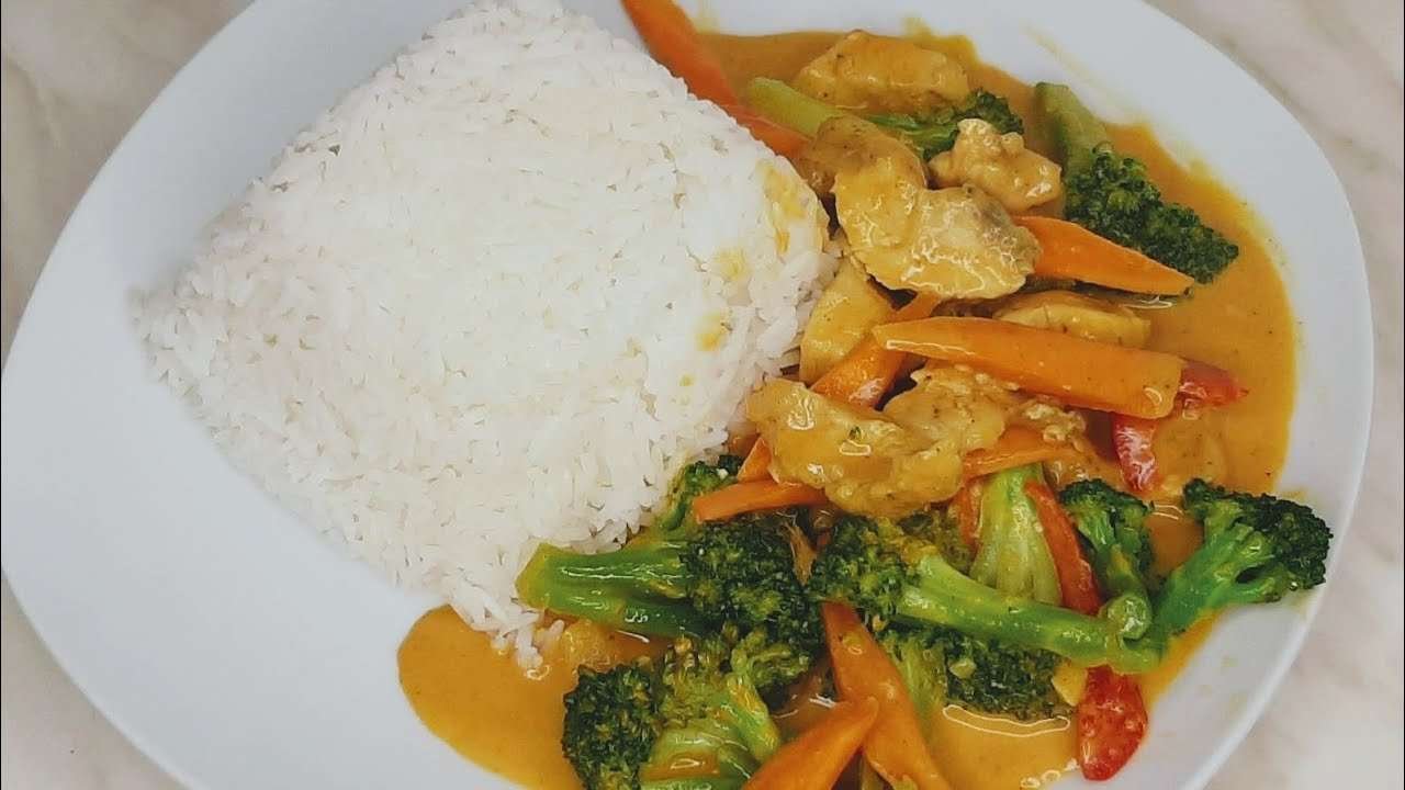 mouthwatering chicken curry in coconut source