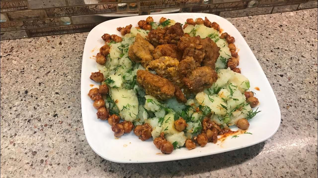 Boneless chicken thighs with dill garlic potatoes and chickpeas.