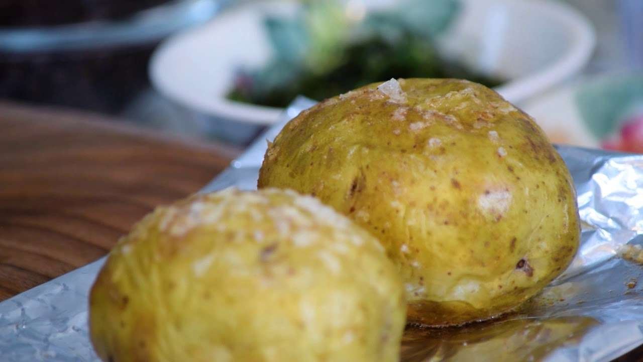 BAKED POTATO, LENTIL CAVIAR, SMOKED KALE BUTTER SAUCE.