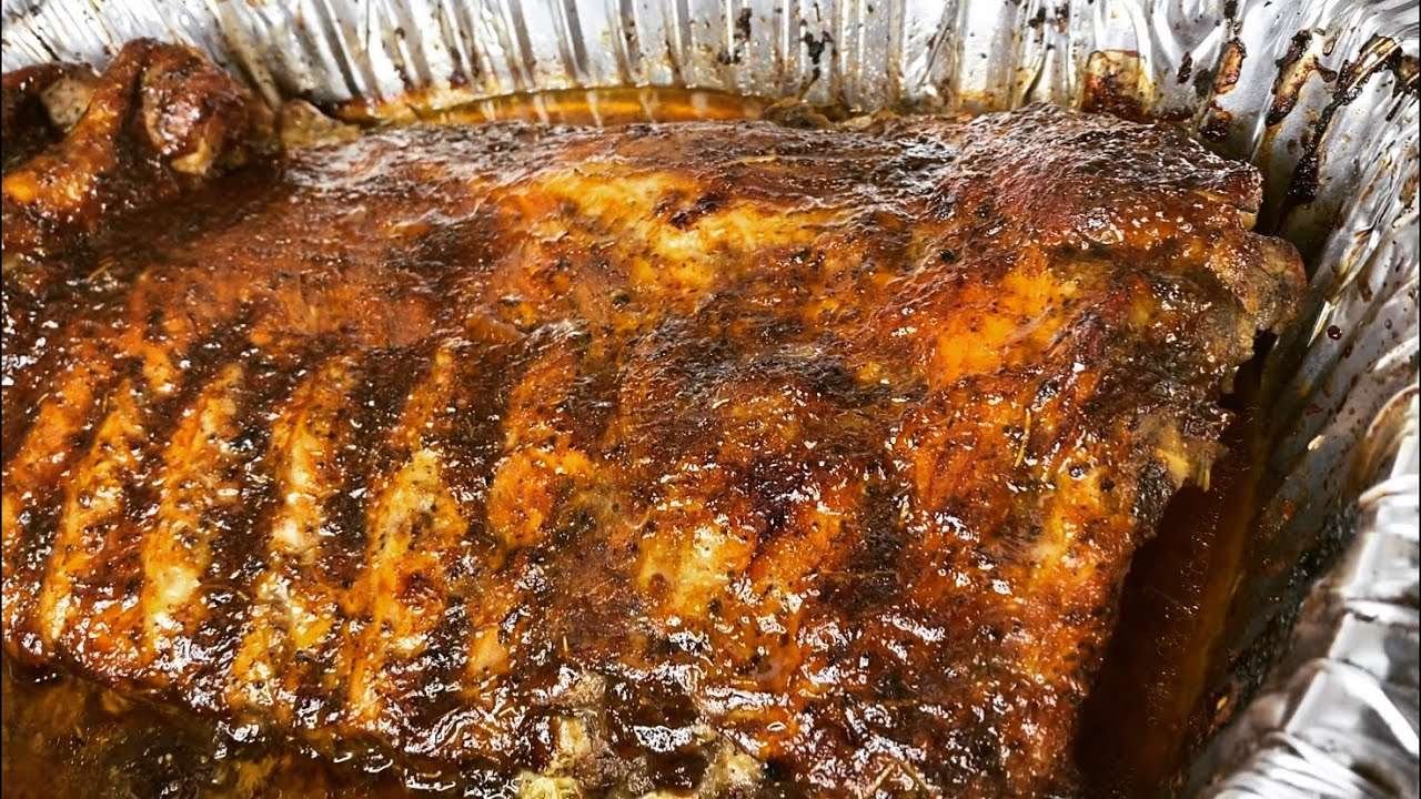 EASY oven baked fall off the bone barbecue ribs!