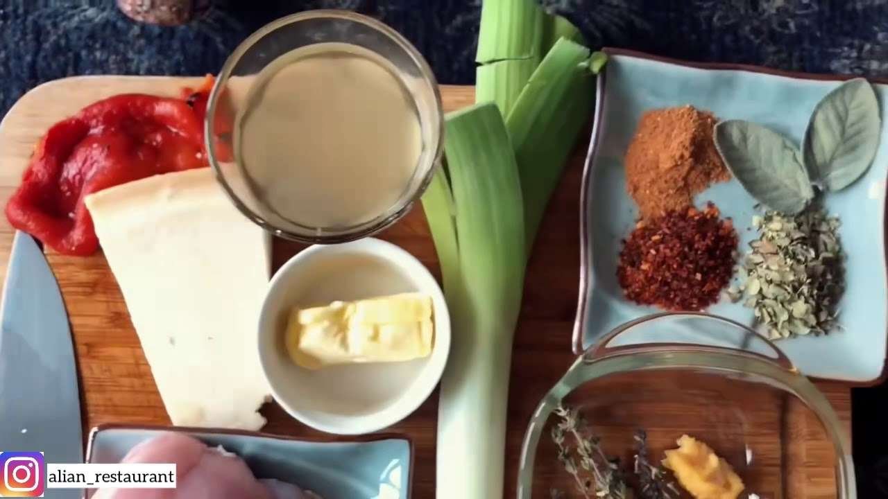 Chicken breast stuffed with leeks, grilled bell peppers and parmesan