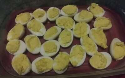 Deviled Eggs topped with Bacon bits and smoked paprika