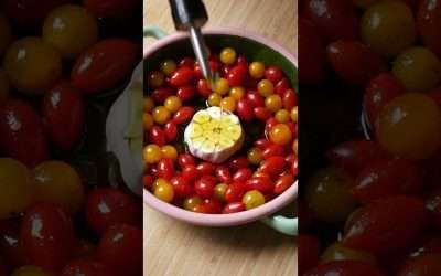 Slow roasted garlic and tomatoes with olive oil and balsamic glaze on toast with burrata